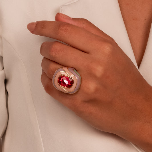 Clementine -ring burst of vibrant colors surrounding a rectangular ruby centerpiece.