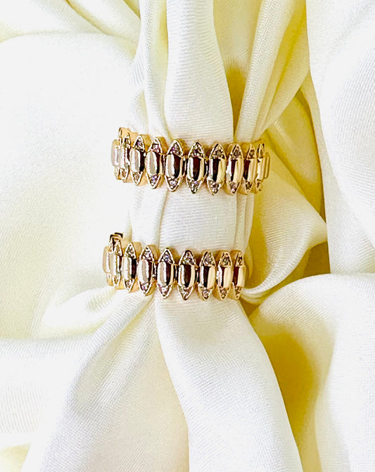 Crown - An 18k gold-plated half eternity ring with micro zirconia accents