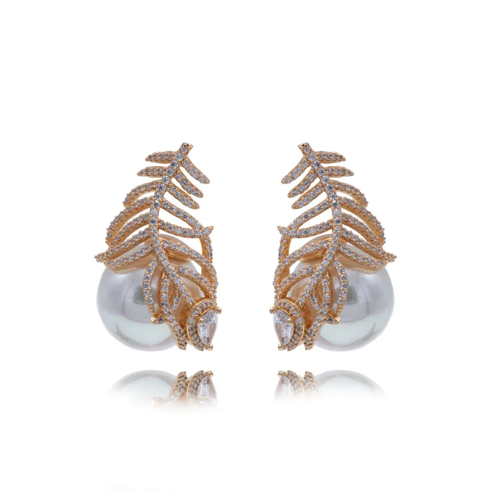 Lyra - Shell pearl and zirconia accents in a classic elegant earrings.