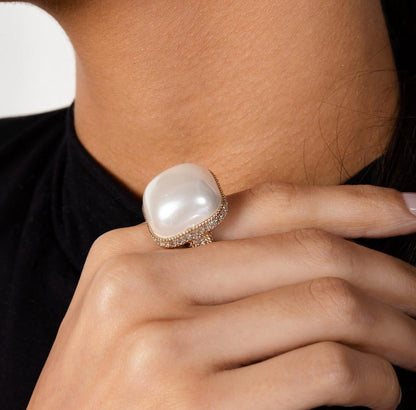 Ava - Maxi pearl ring dorned with micro zirconia accents throughout the piece.